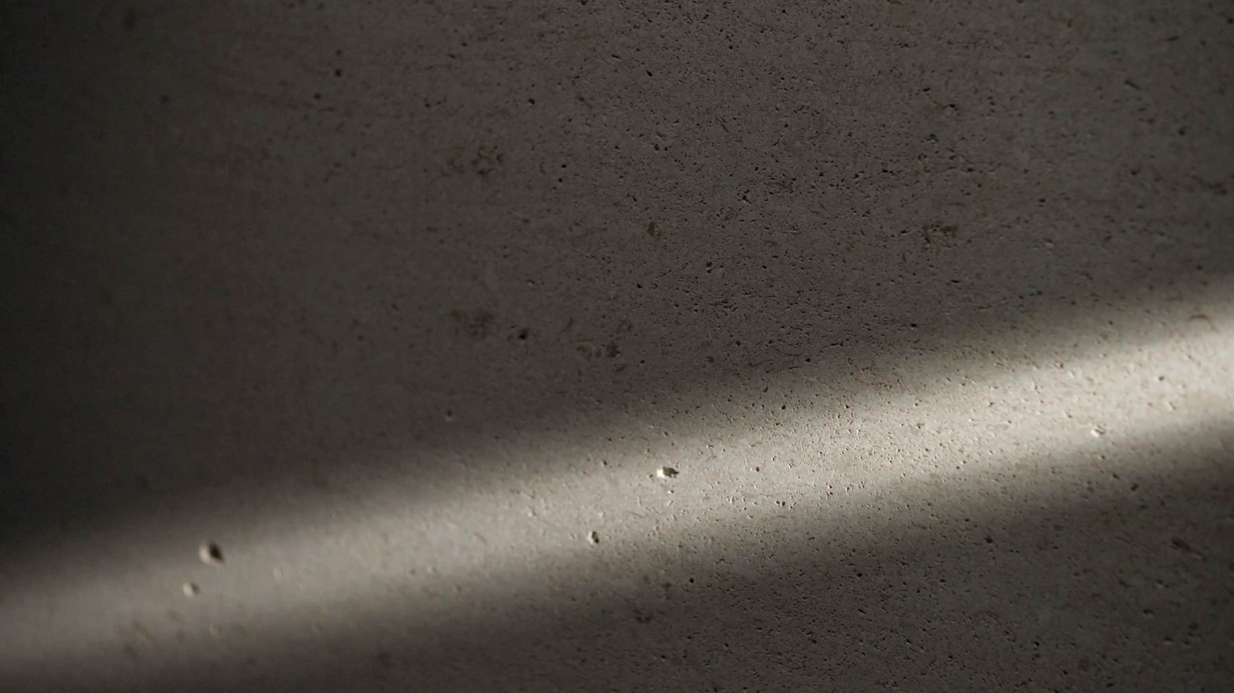 Raking light across a hand-applied Interiology coating